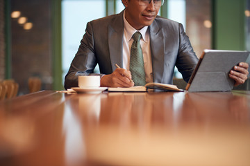 Businessman taking notes