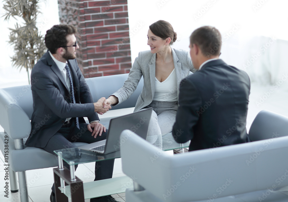 Wall mural business handshake women with the client