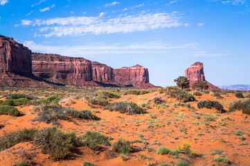 Picturesque ancient rocks in the Valley of Monuments. Noon in the desert