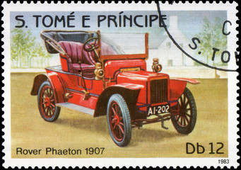 Postage stamp printed in S.Tome e Principe shows image of the retro car Rover Phaeton 1907 year of...