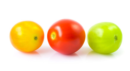 Fresh colorful cherry tomatoes on white background, raw food and vegetable concept