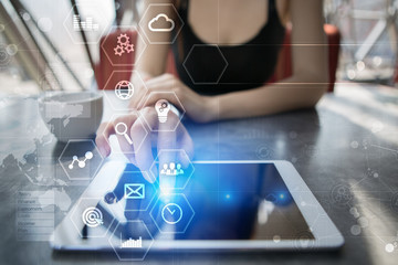 Business and technology concept. Graphs and icons on virtual screen.