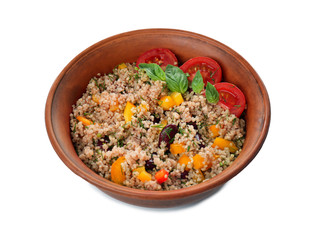 Vegetable salad with quinoa in bowl isolated on white
