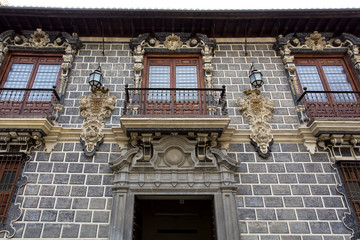 Fototapeta na wymiar The facade of Palacio de la Madraza, Madrasah of Granada, in Granada