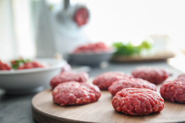 Cutlets made from forcemeat on wooden board