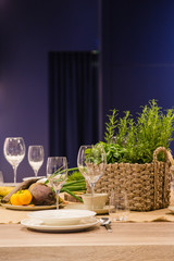 Table setting decor with cutlery, plates and glasses