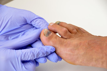 doctor examining patient