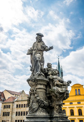 Picturesque old statue on the Charles Bridge in Prague