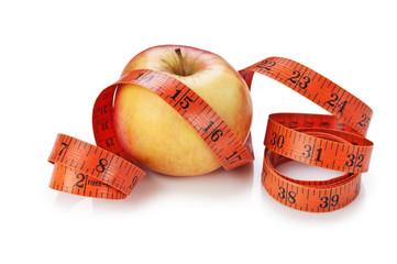 measure tape and apple isolated