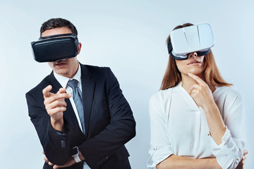 Pensive colleagues considering over something