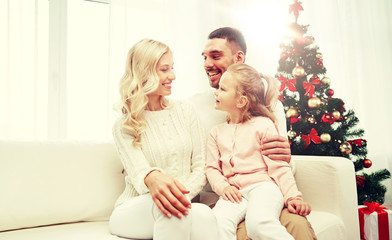 happy family at home with christmas tree