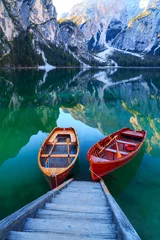Peel and stick wall murals Lake / Pond Braies lake and boats in the background of Seekofel mountain  ( Pragser Wildsee )