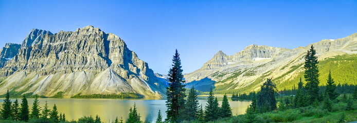 Panoramic view of  Mountains and Lake in Banff National Park, Rocky Mountains, Alberta, Canada.