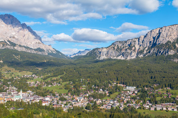 Fototapeta na wymiar Cortina D'Ampezzo is a beautiful alpine resort in the background with wonderful mountain peaks, Trentino Alto Adige region, Dolomites