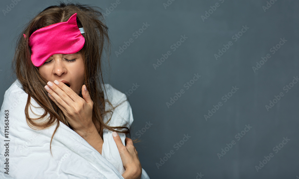 Canvas Prints portrait of yawning woman with blanket.