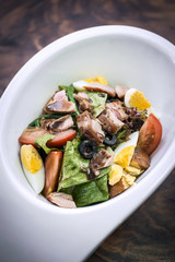 organic mixed salad with chicken and egg in modern style