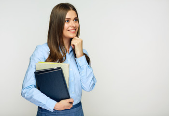 Smiling woman student, teacher or business lady holding books.