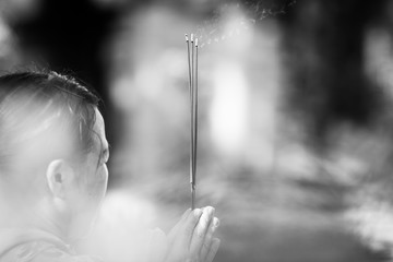 NHA TRANG, VIETNAM - JULY 2017: Buddhist woman praying in Po Nagar cham towers