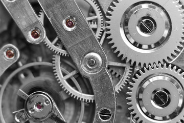 Silver Clockwork. Detail of watch machinery. Old mechanical pocket watch. Macro shot.  