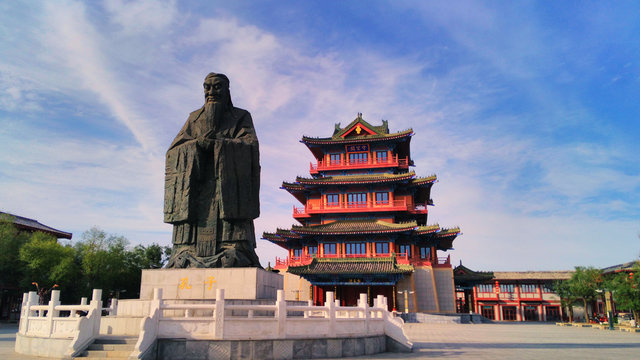  the giant  statue of Confucius and ancient chinese pavilion in the ancient capital  Kaifeng, China