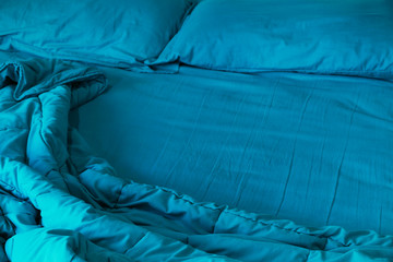crumpled bedding after getting up for pattern and background