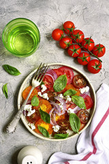 Tomato salad with feta cheese.Top view.