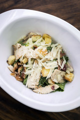 grilled chicken salad with croutons and parmesan cheese