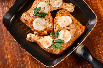 Raw chicken legs marinated