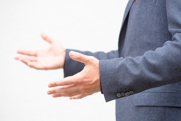 Fototapeta premium Close up hands of a male public speaker while giving a speech. 