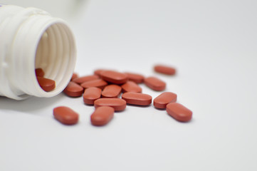 Health vitamins on a daily basis keeping with the concept of medical pill capsule.