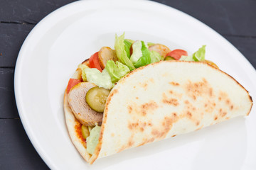 sandwich wrap with meat and vegetables