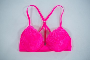 High angle view of vibrant pink bra