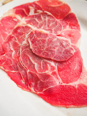 Sliced raw beef on the dish