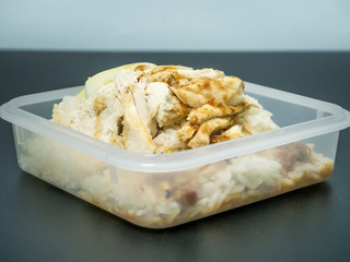 Hainanese chicken rice or steam chicken rice with sauce in box lunch