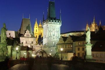Fototapeta na wymiar Lesser Tower of Charles Bridge Prague taken at night with the castle in the background