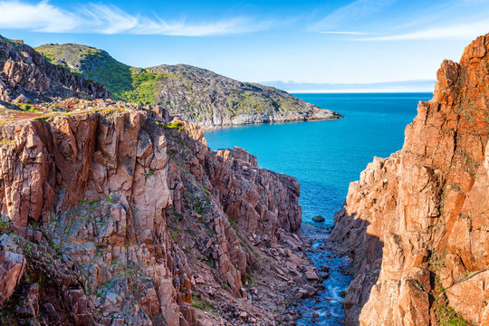 beautiful mountain landscape, red rocks, beautiful sea, blue sky