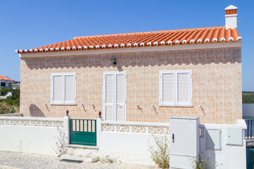 Fototapeta na wymiar Typical portuguese House in Arrifana