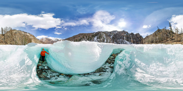 Female inside the crack in the ice glaciers Iceland. Spherical 360 180 vr panoramas