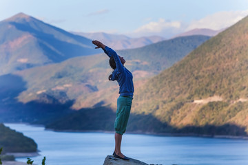 woman yoga in the mountains