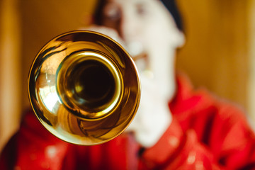 man plays the trumpet