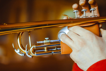 man plays the trumpet
