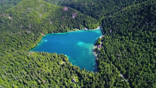 Lake Lago di Fusine Superiore Italy Alps. Aerial FPV drone flights.