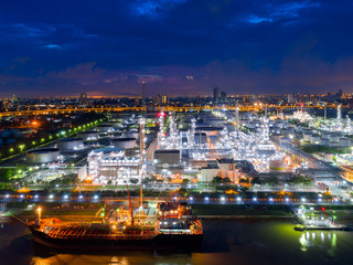 Aerial view of twilight of oil refinery ,Shot from drone of Oil refinery and Petrochemical plant at dusk , Bangkok, Thailand