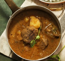 Indian Mutton Lamb curry served with rice