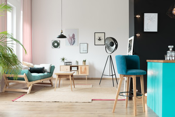 Blue stool in kitchen area