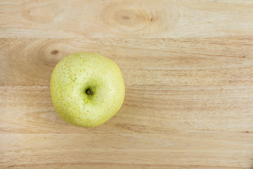 Top view of chinese pear on the wooden table
