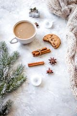 Christmas evening with cup of cocoa white background top view