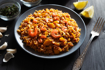 Fried rice with shrimps, lemon and vegetables