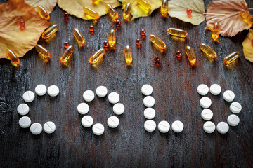 concept autumn cold treatment on wooden background top view