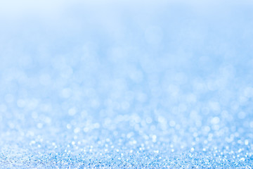 blue abstract blurred glitter Bokeh background